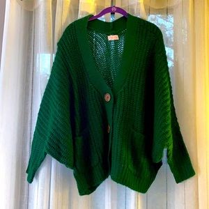 Green button up poncho
